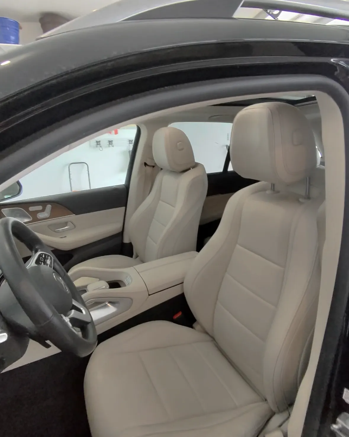 Clean cream leather front seats of a Mercedes GLE